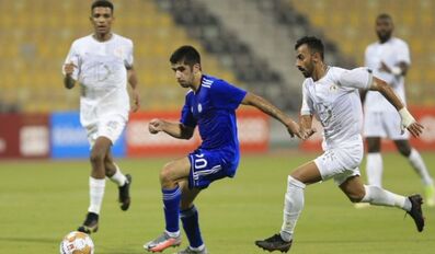 Al Khor and Al Arabi players in action